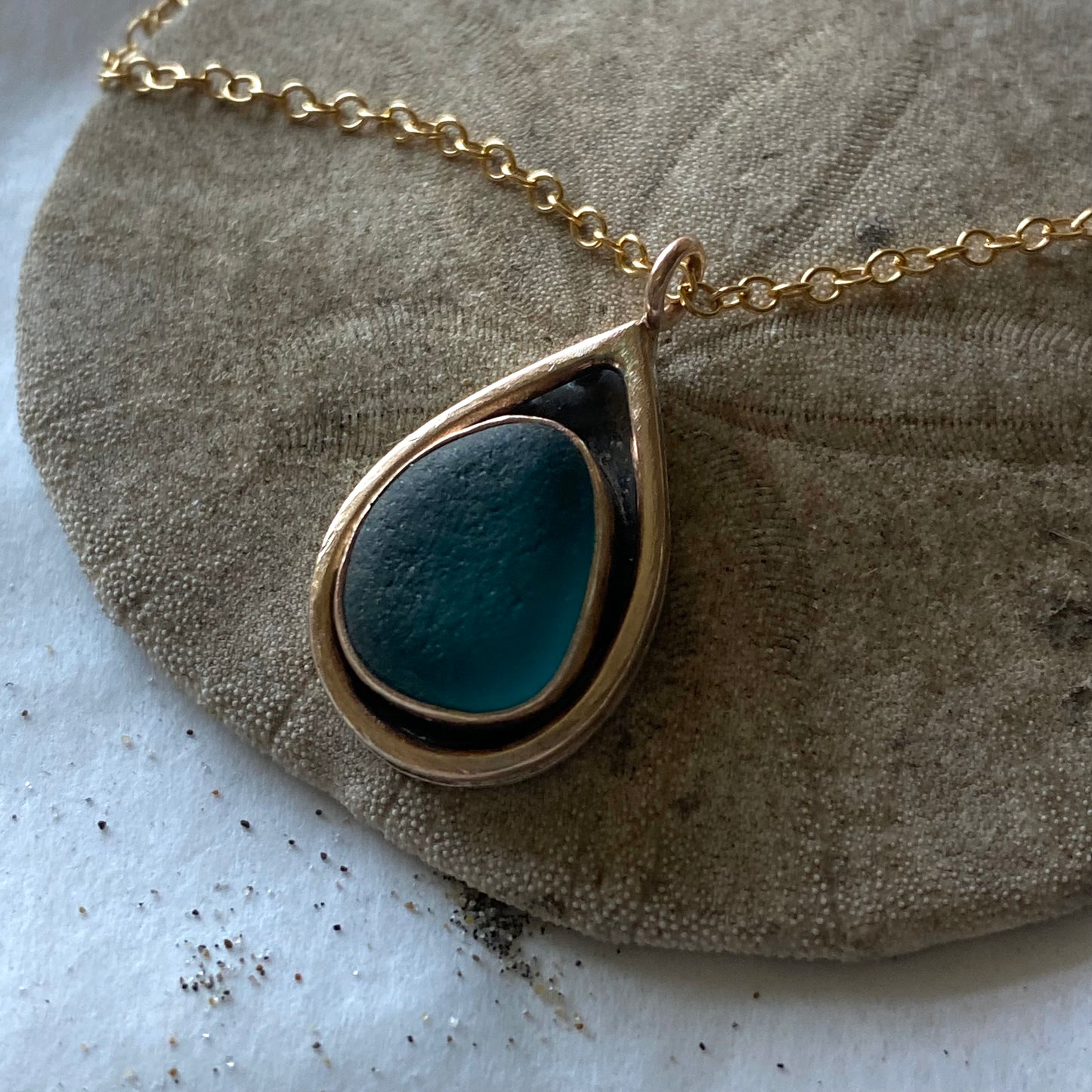 The Mermaid Tail Pendant - The Mermaid Tail Necklace. Beautiful piece of sea glass nested in a hand-crafted in a sterling silver bezel with 14k gold fill accents. Kate Samson Design