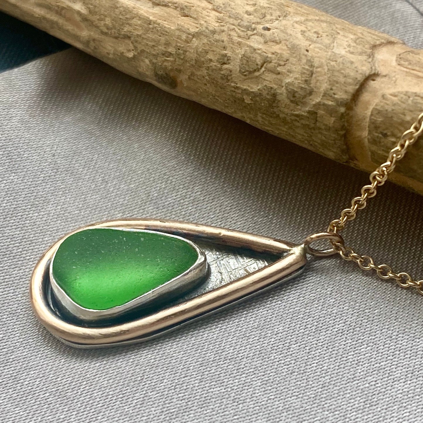 The Mermaid Tail Pendant - The Mermaid Tail Necklace. Beautiful piece of sea glass nested in a hand-crafted in a sterling silver bezel with 14k gold fill accents. Kate Samson Design